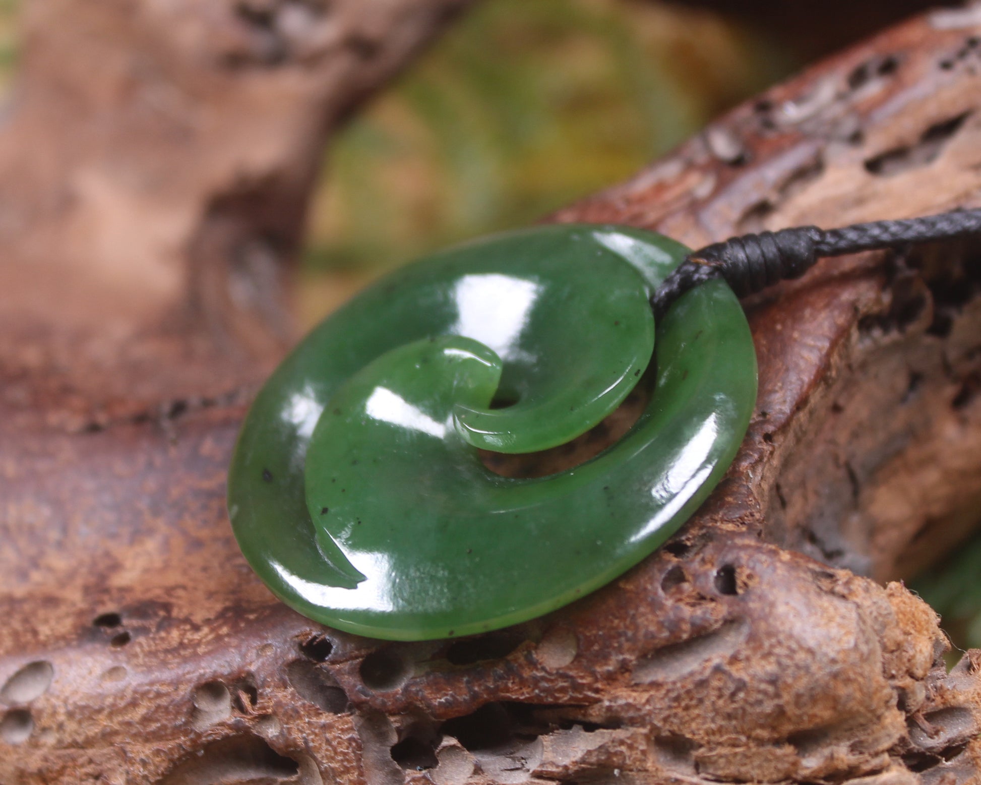 Koru pendant carved from Kawakawa Pounamu - NZ Greenstone