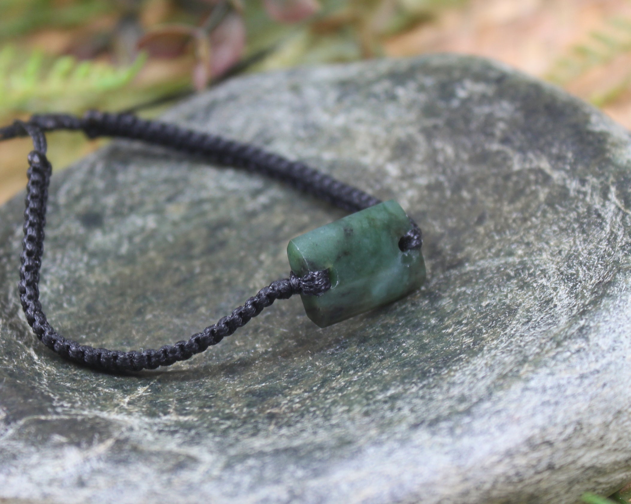 Adjustable cord bracelet with Rimu Pounamu