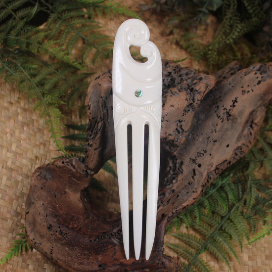 Heru with Koru carved from beef bone