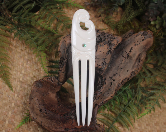 Heru with Koru carved from beef bone