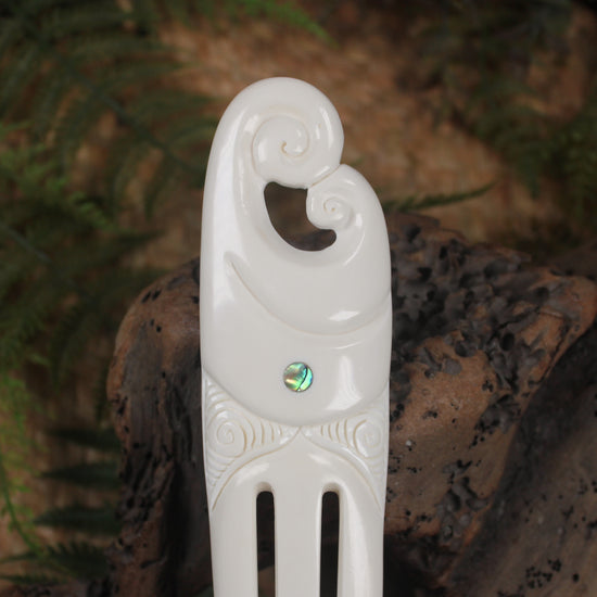 Heru with Koru carved from beef bone