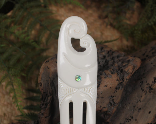 Heru with Koru carved from beef bone