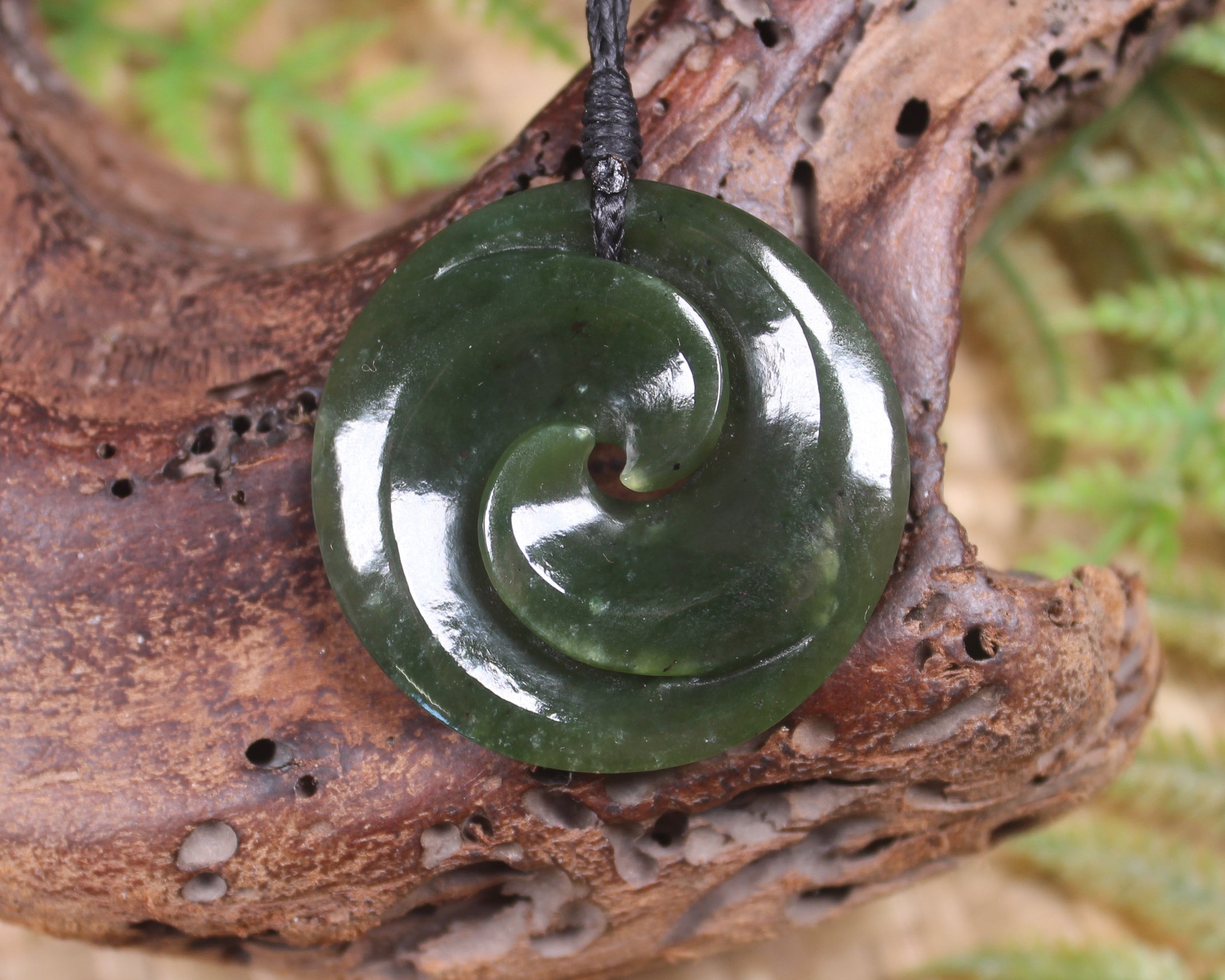 Koru carved from Rimu Pounamu - NZ Greenstone