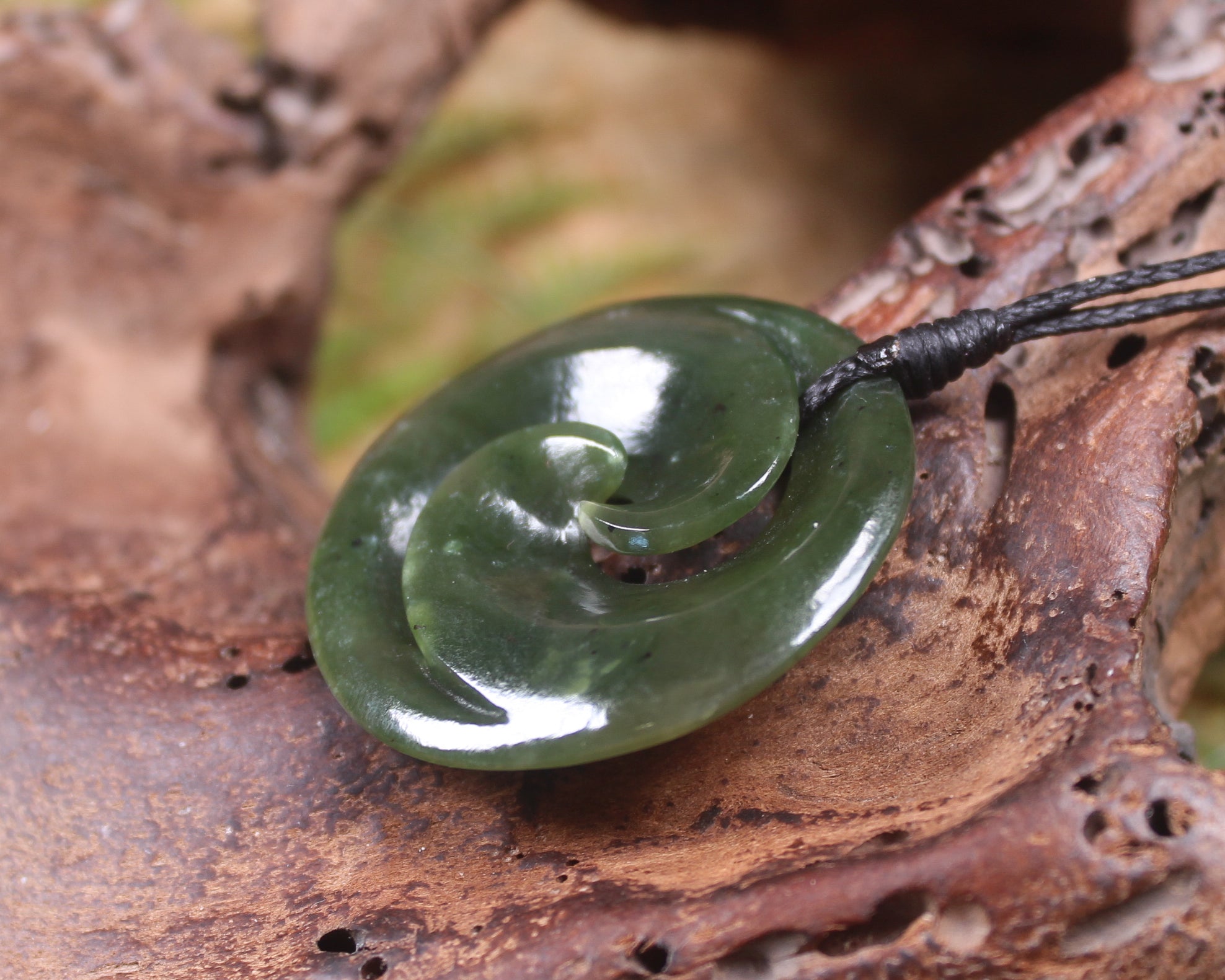 Koru carved from Rimu Pounamu - NZ Greenstone