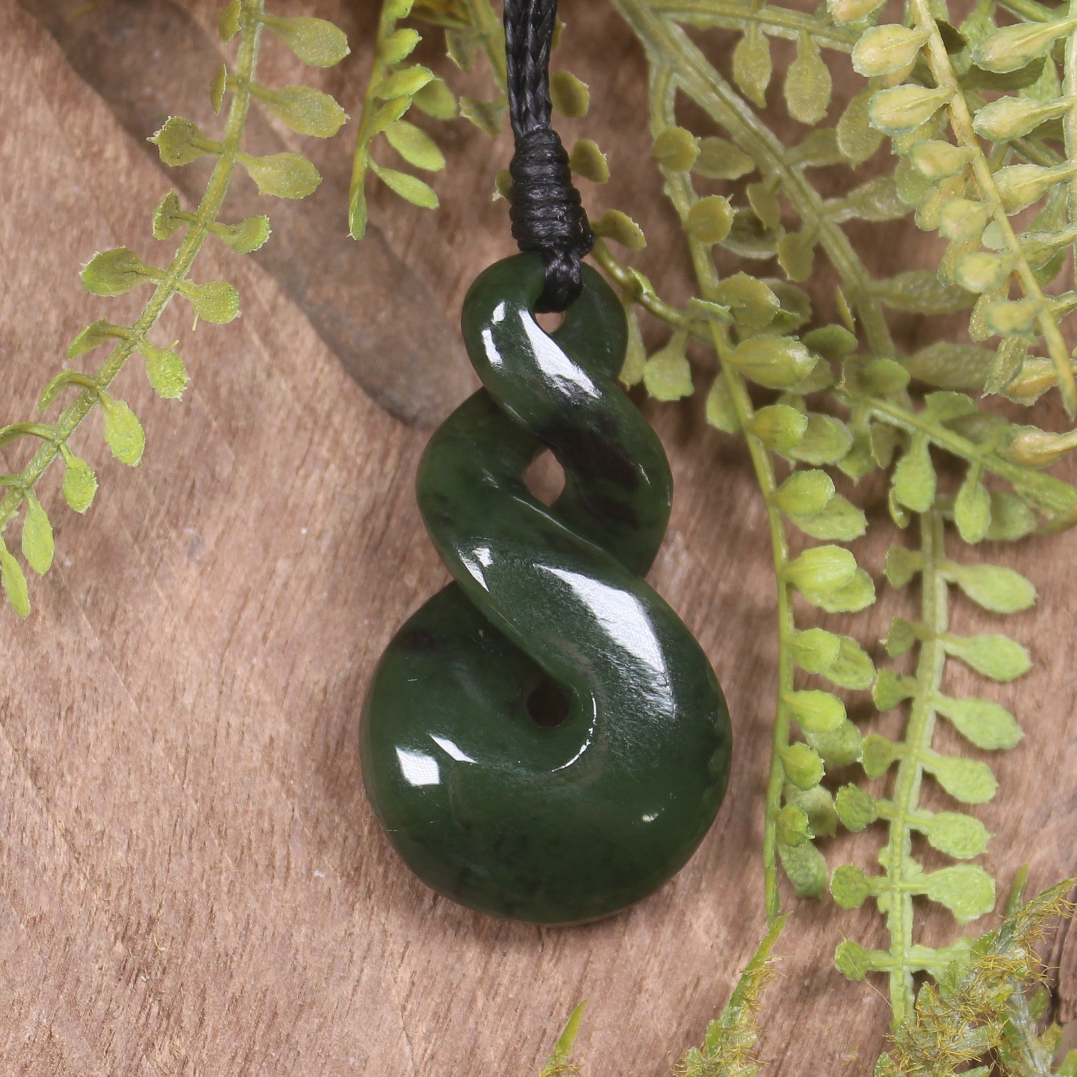 Twist carved from Kawakawa Pounamu - NZ Greenstone