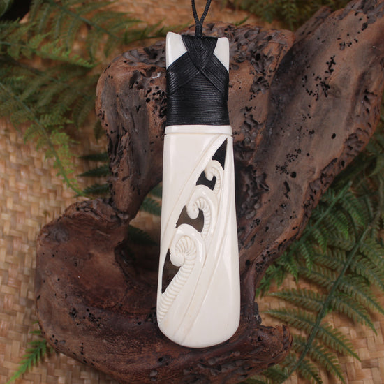 Toki or Adze with Koru carved from Beef Bone