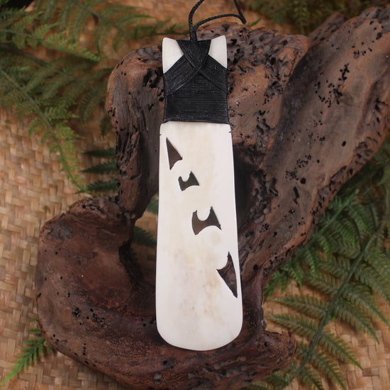Toki or Adze with Koru carved from Beef Bone