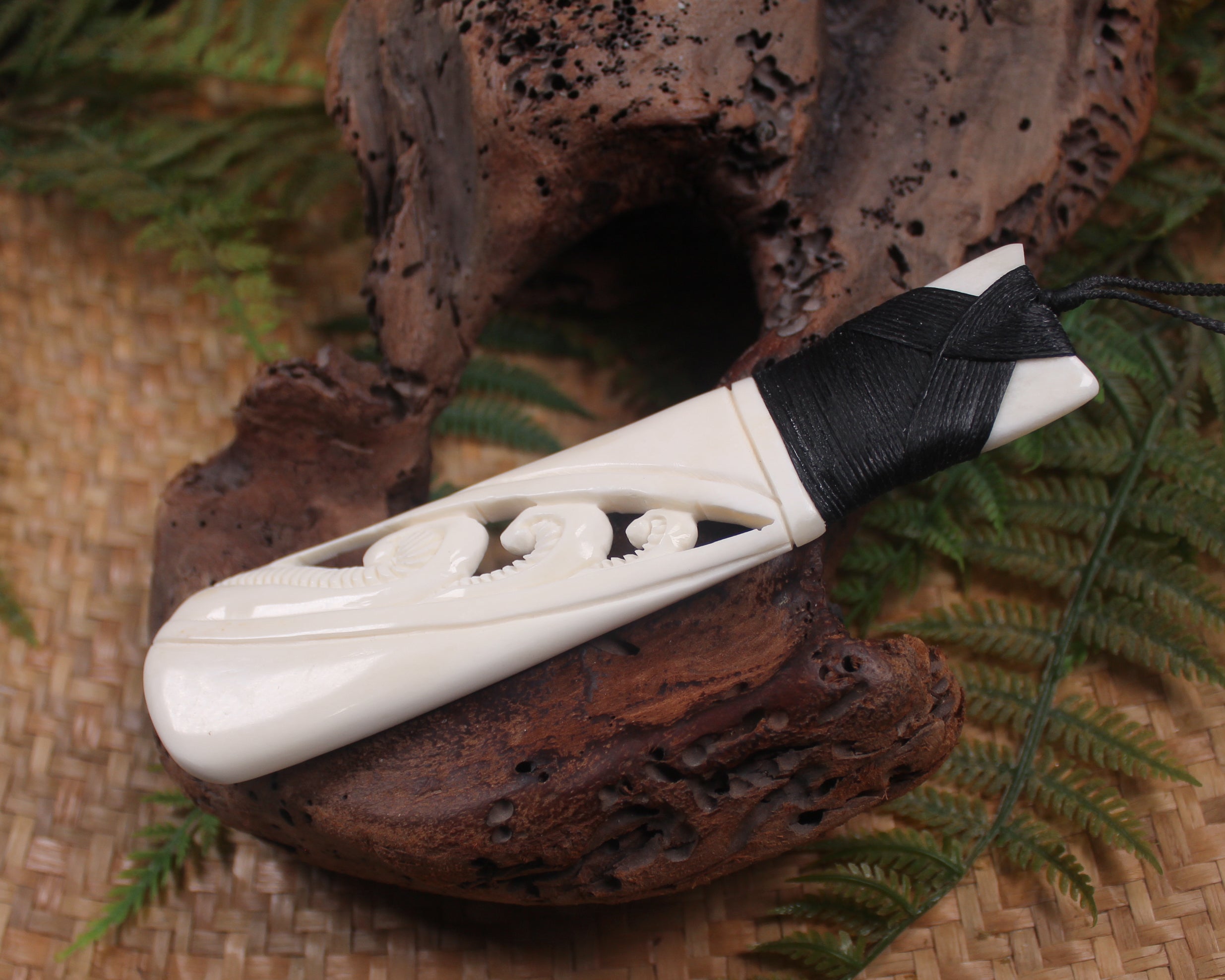 Toki or Adze with Koru carved from Beef Bone