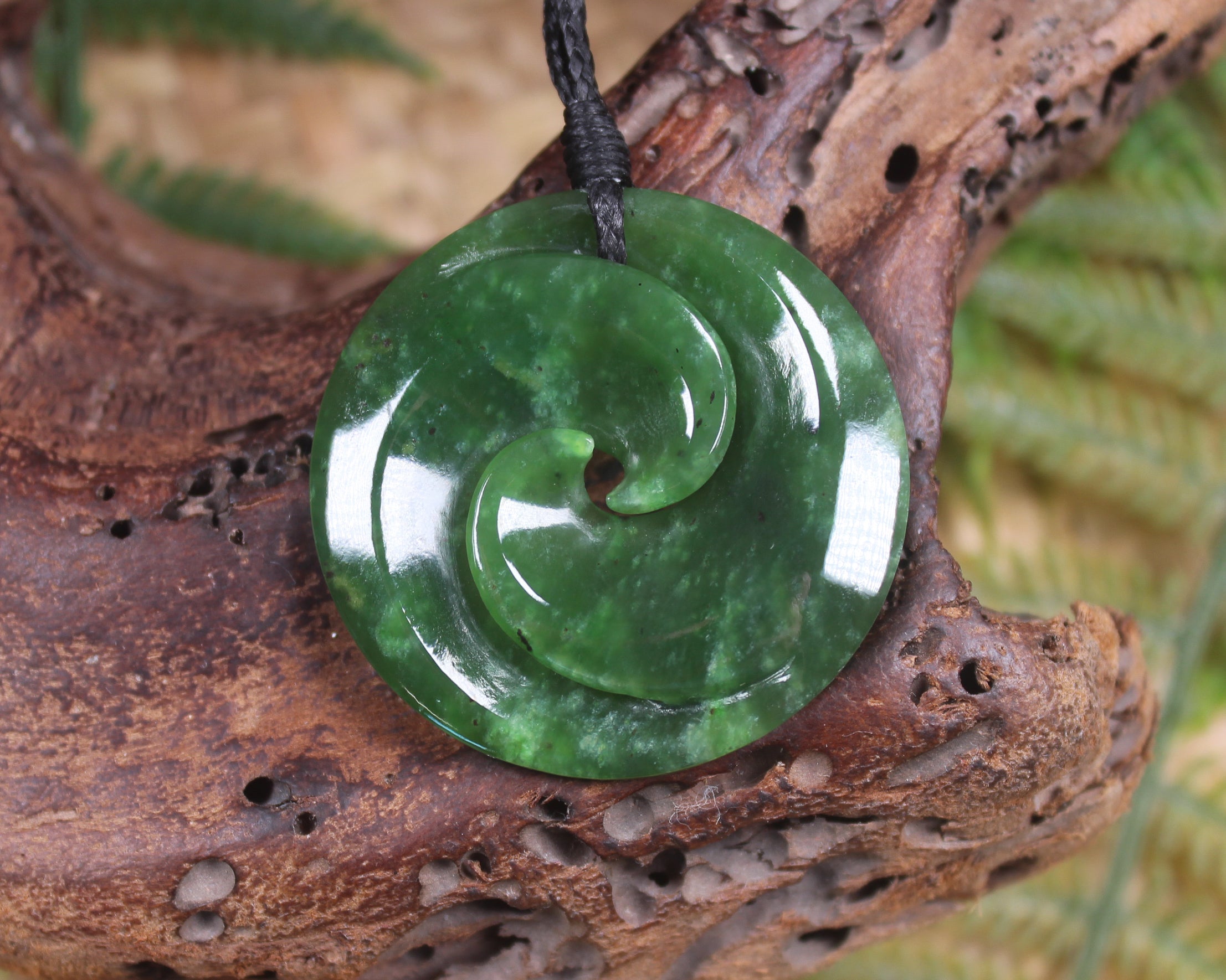 Koru pendant carved from Kawakawa Pounamu - NZ Greenstone