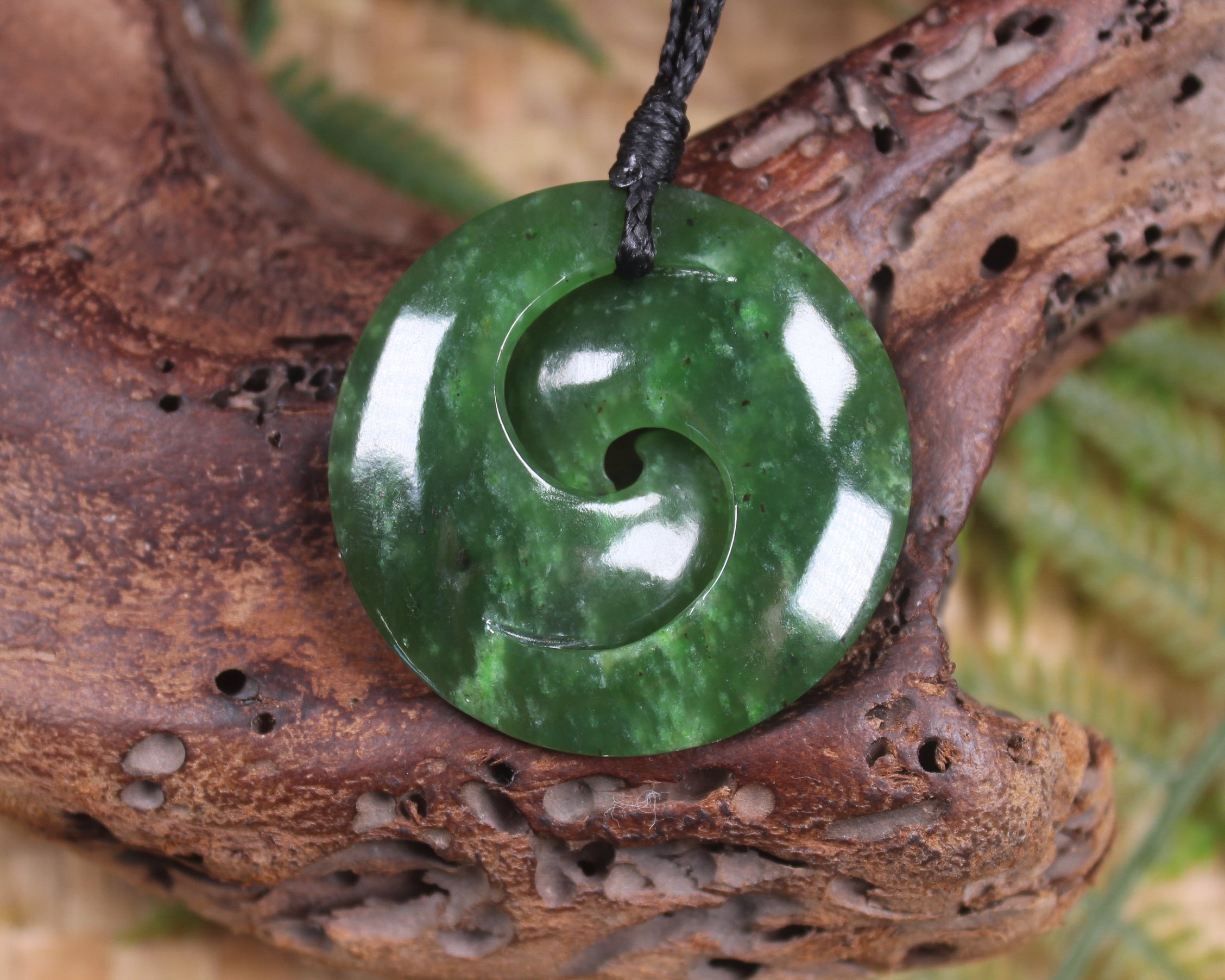 Koru pendant carved from Kawakawa Pounamu - NZ Greenstone