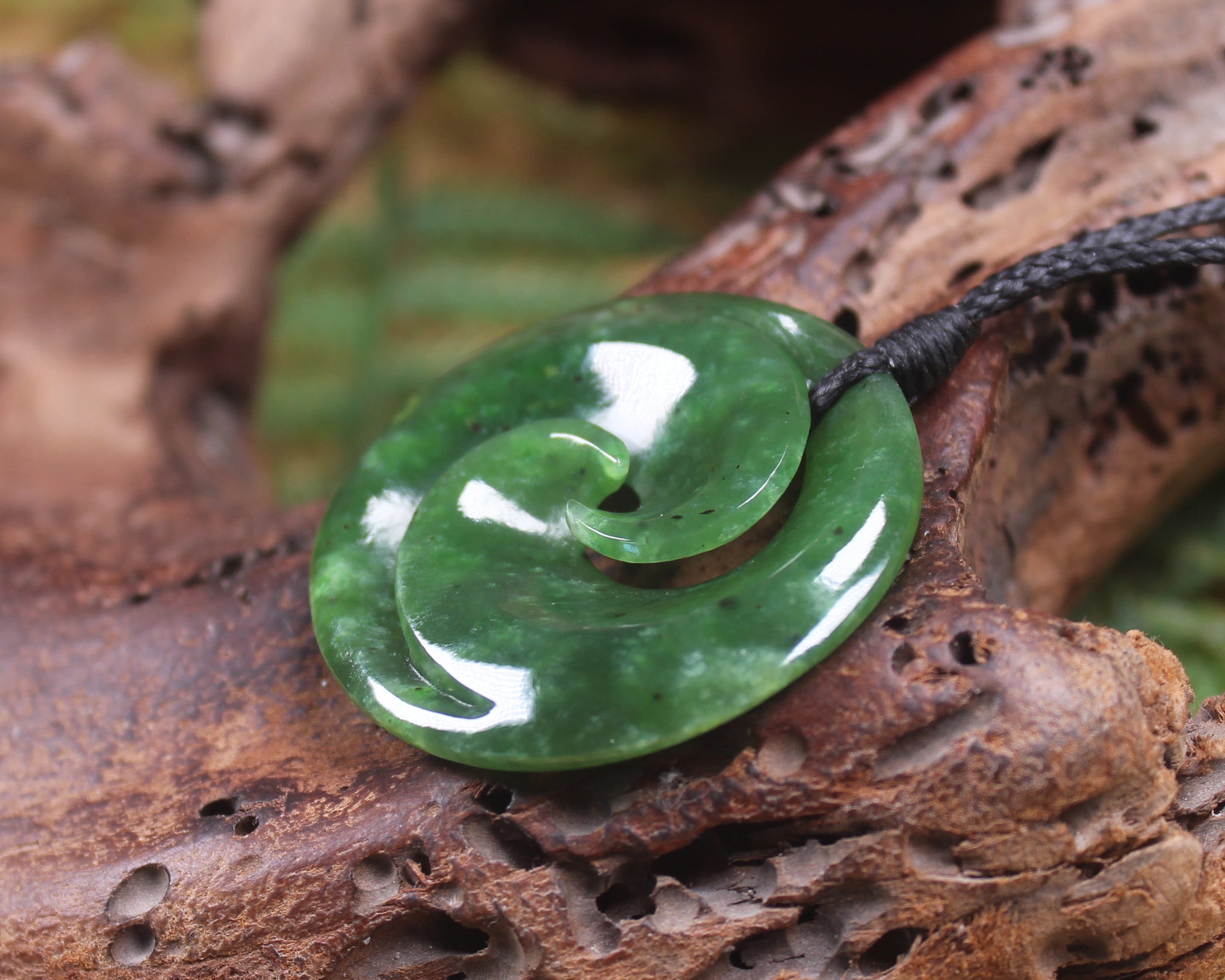 Koru pendant carved from Kawakawa Pounamu - NZ Greenstone