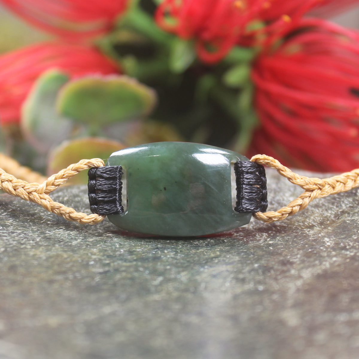 Adjustable cord bracelet with Hapopo Pounamu
