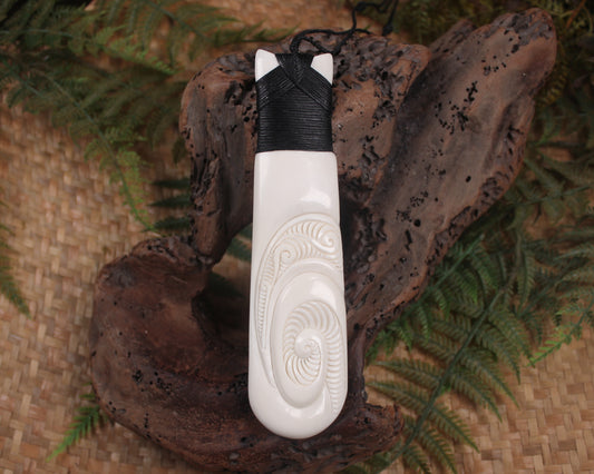 Toki or Adze with Koru carved from Beef Bone