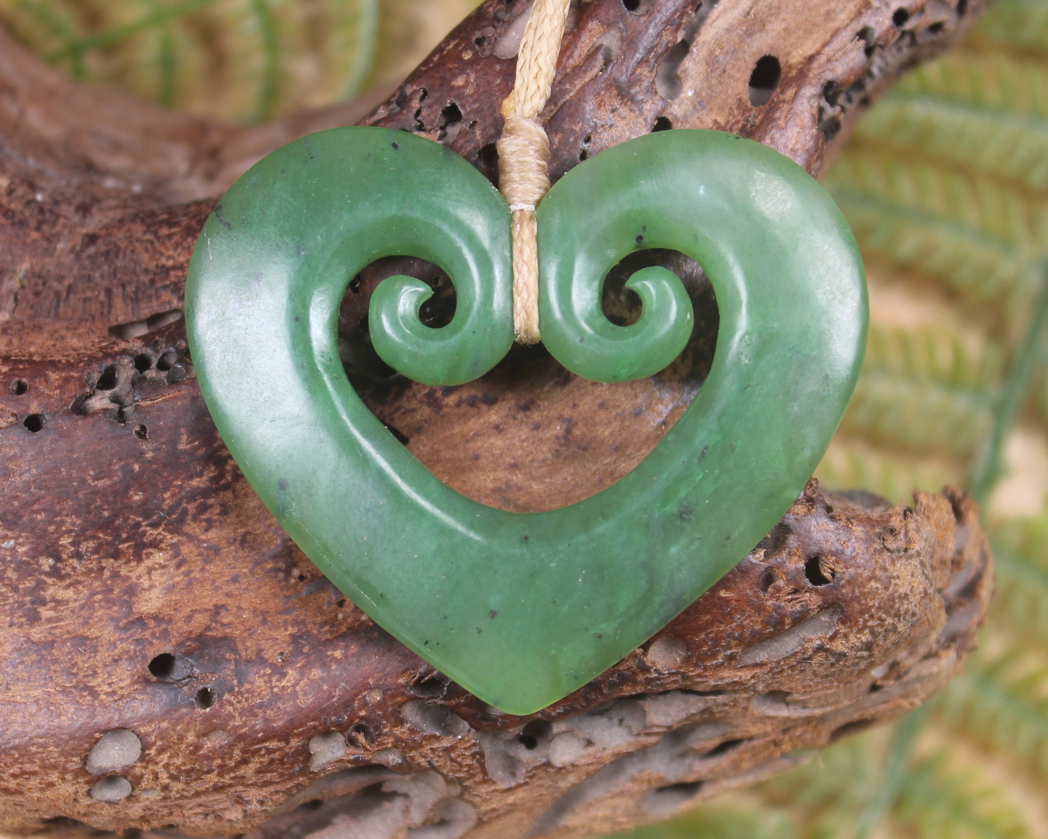 Koru Heart pendant carved from Hapopo Pounamu - NZ Greenstone