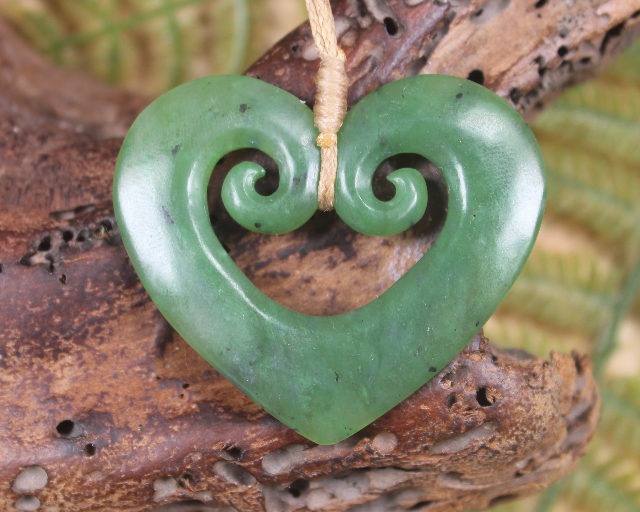 Koru Heart pendant carved from Hapopo Pounamu - NZ Greenstone