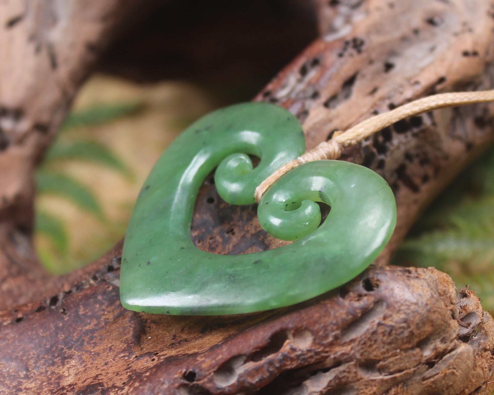 Koru Heart pendant carved from Hapopo Pounamu - NZ Greenstone