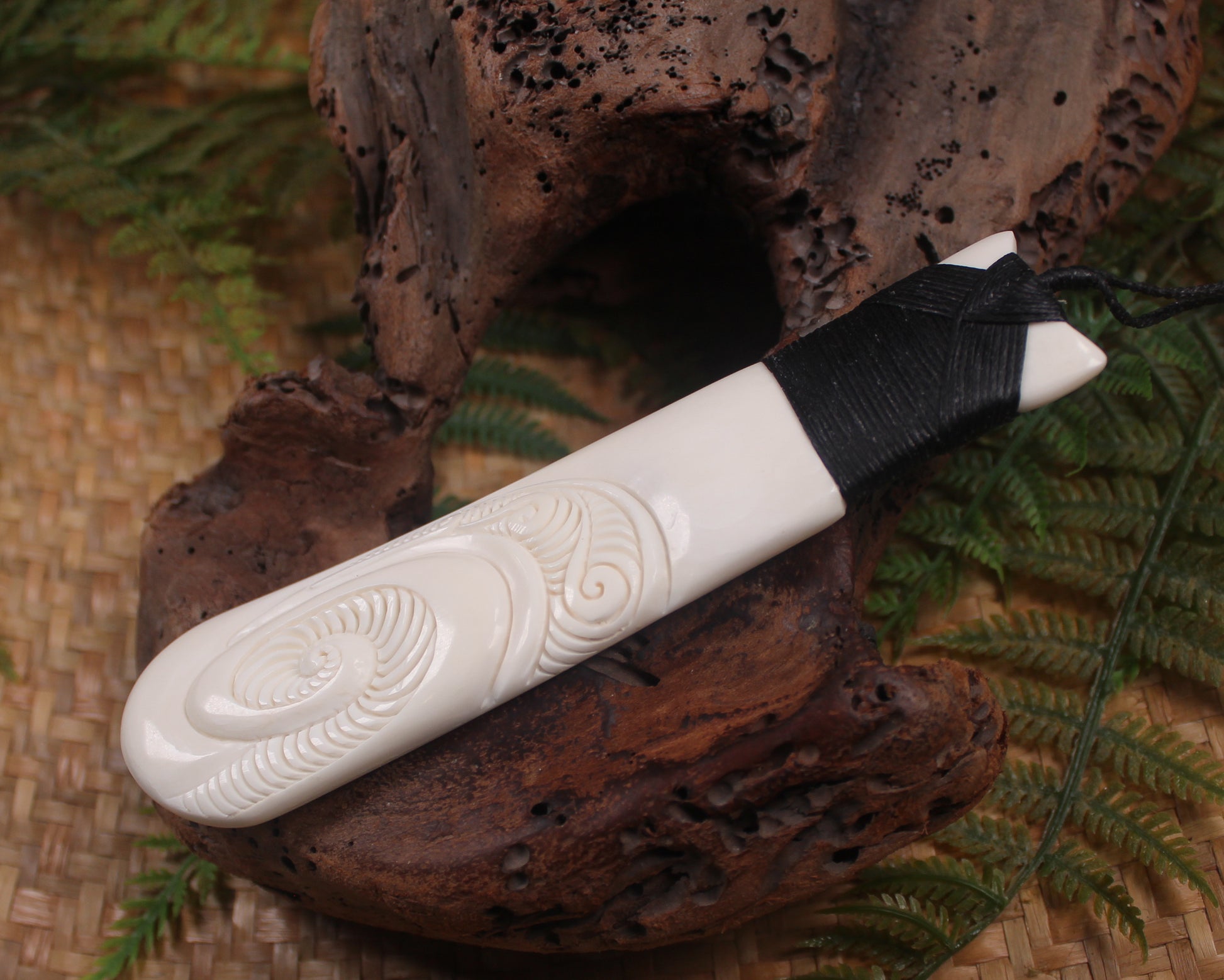 Toki or Adze with Koru carved from Beef Bone
