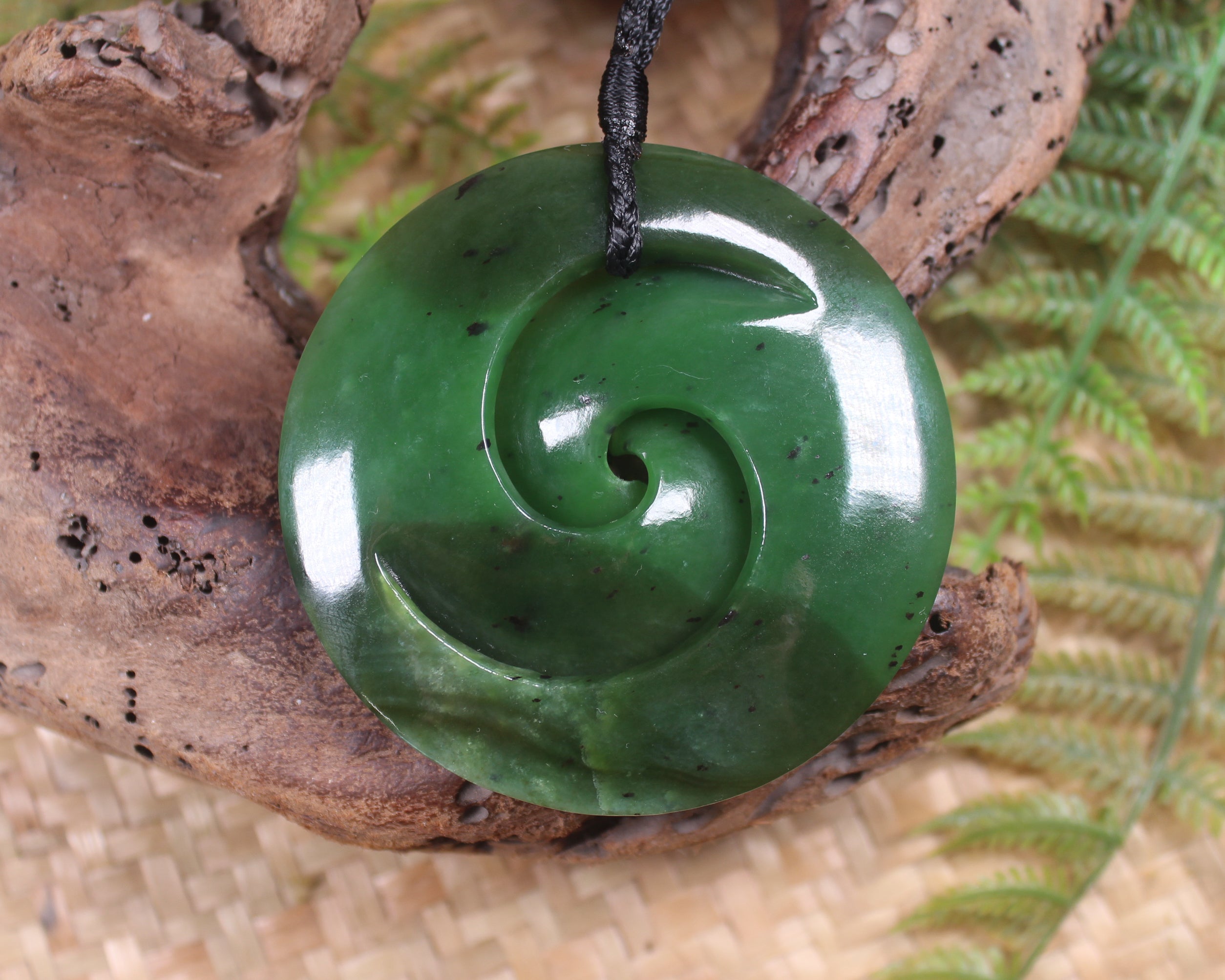 Koru carved from Rimu Pounamu - NZ Greenstone