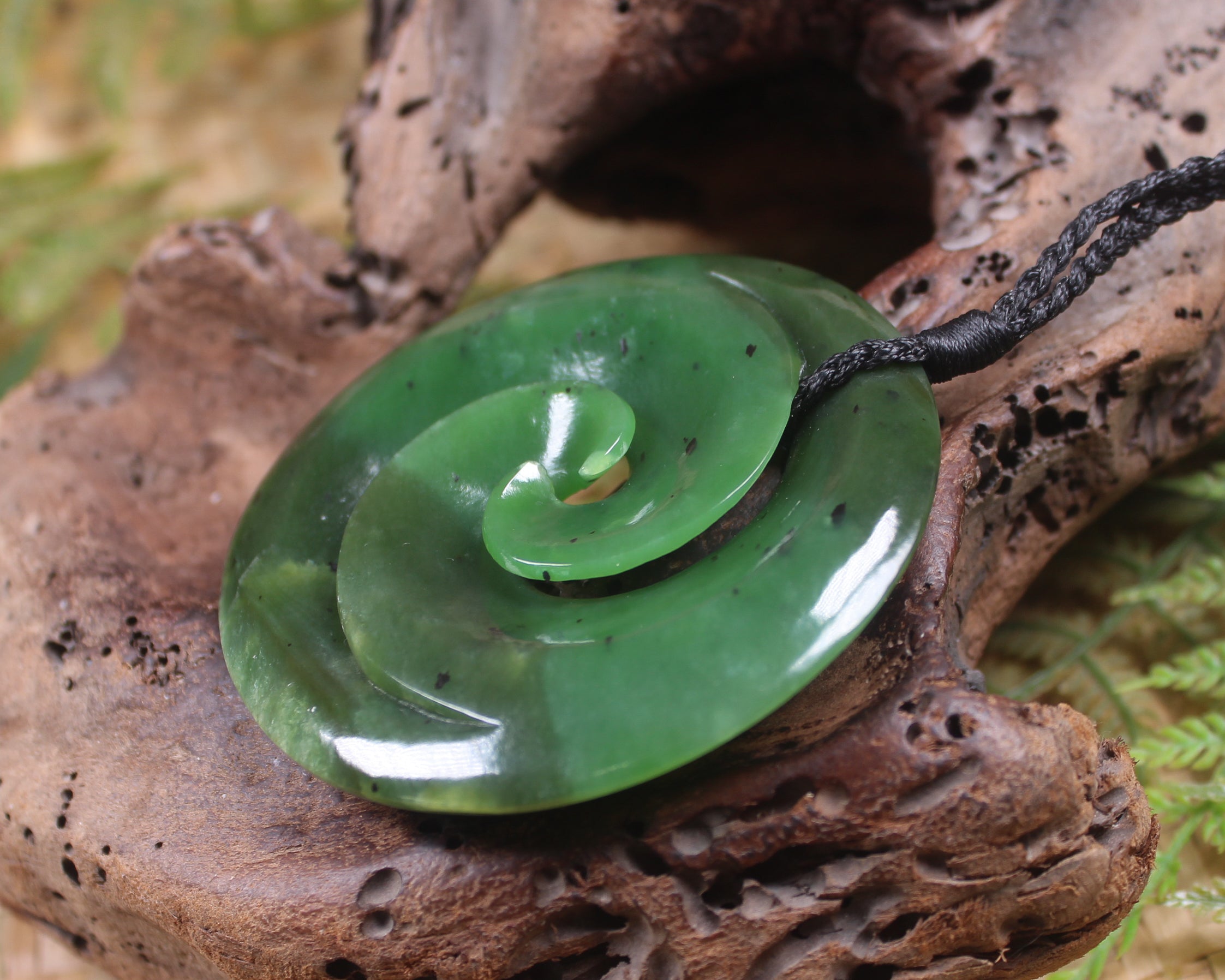 Koru carved from Rimu Pounamu - NZ Greenstone