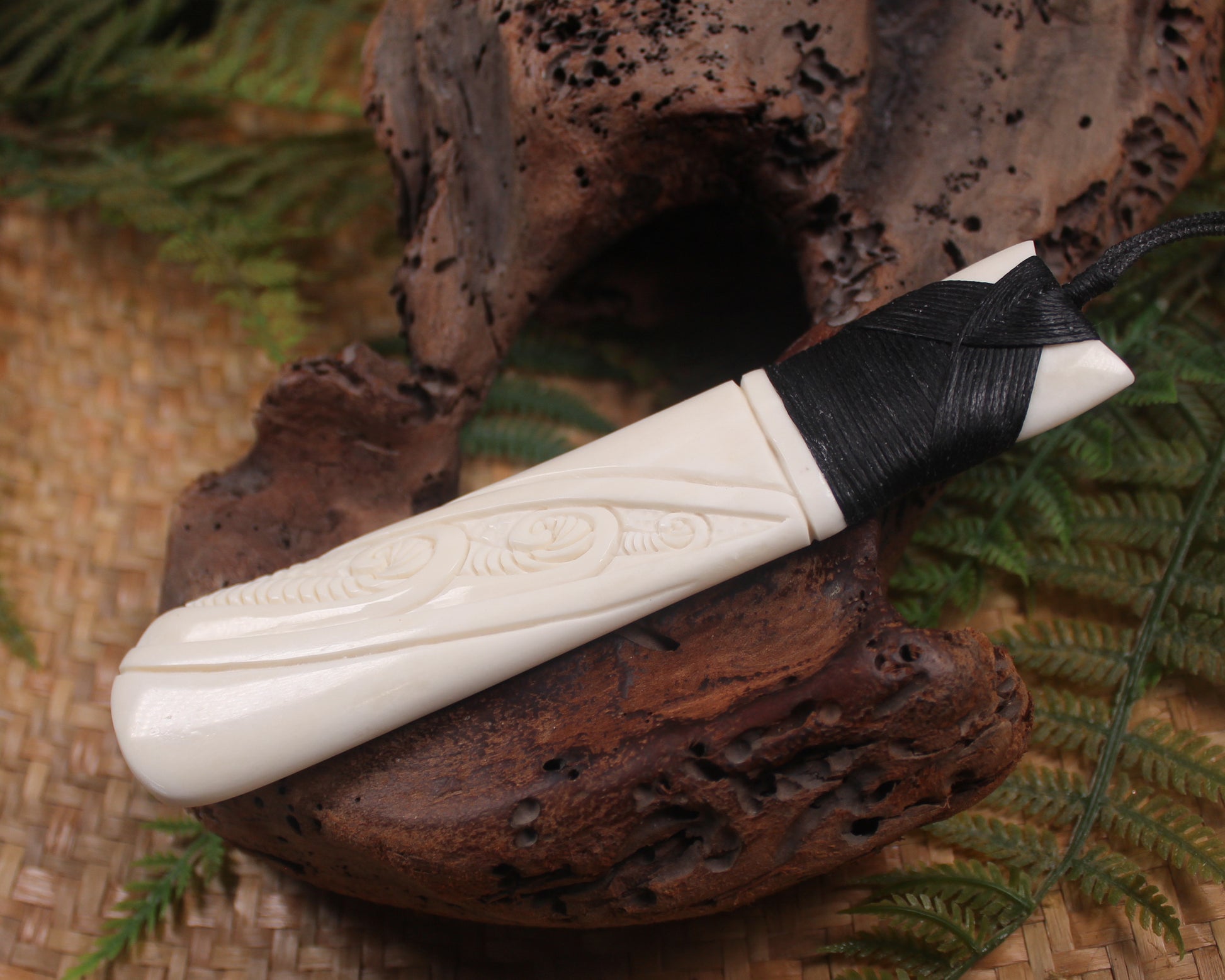 Toki or Adze with Koru carved from Beef Bone