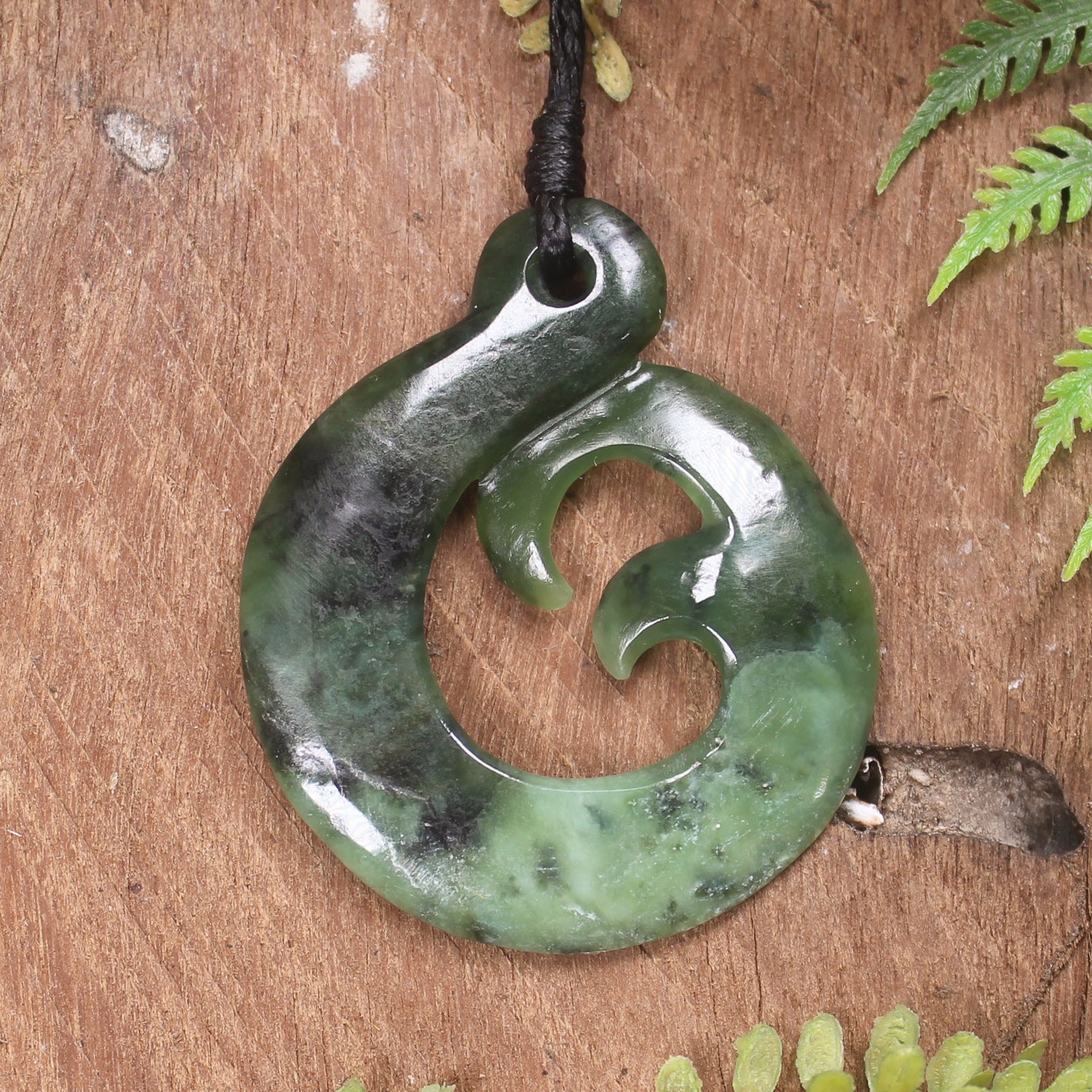 Koru Twist Pendant carved from Rimu Pounamu - NZ Greenstone