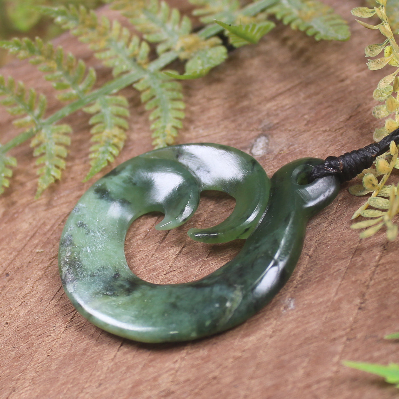 Koru Twist Pendant carved from Rimu Pounamu - NZ Greenstone