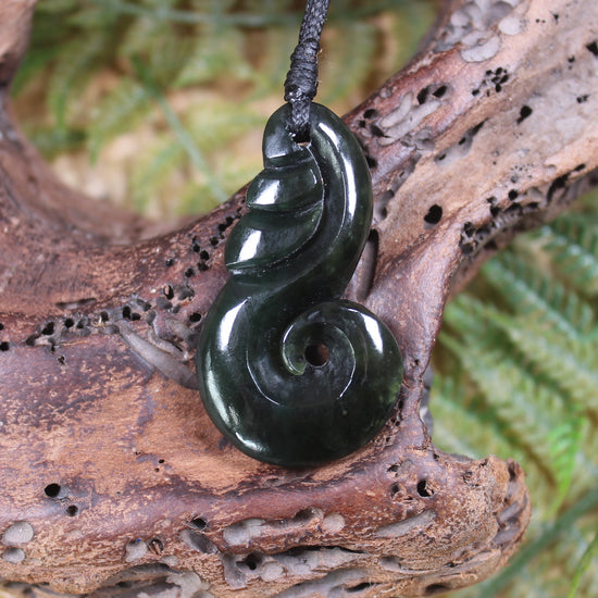 Koru carved from Rimu Pounamu - NZ Greenstone