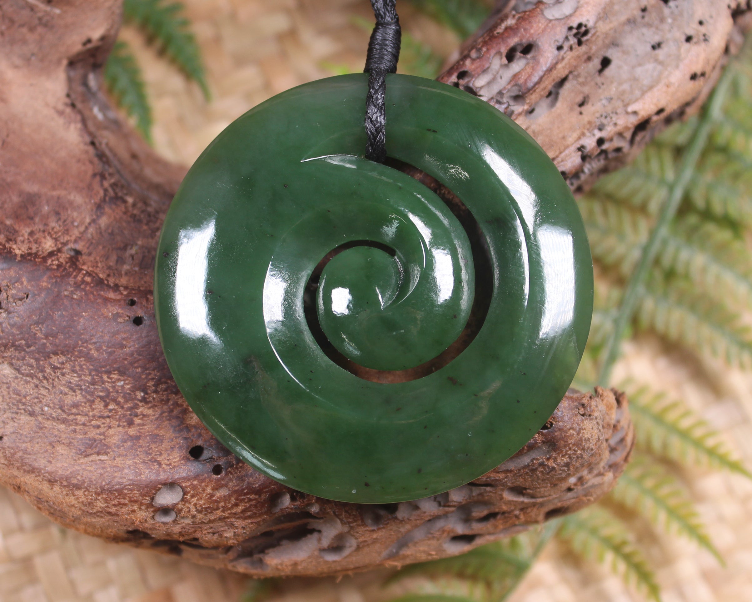 Koru pendant carved from Kawakawa Pounamu - NZ Greenstone