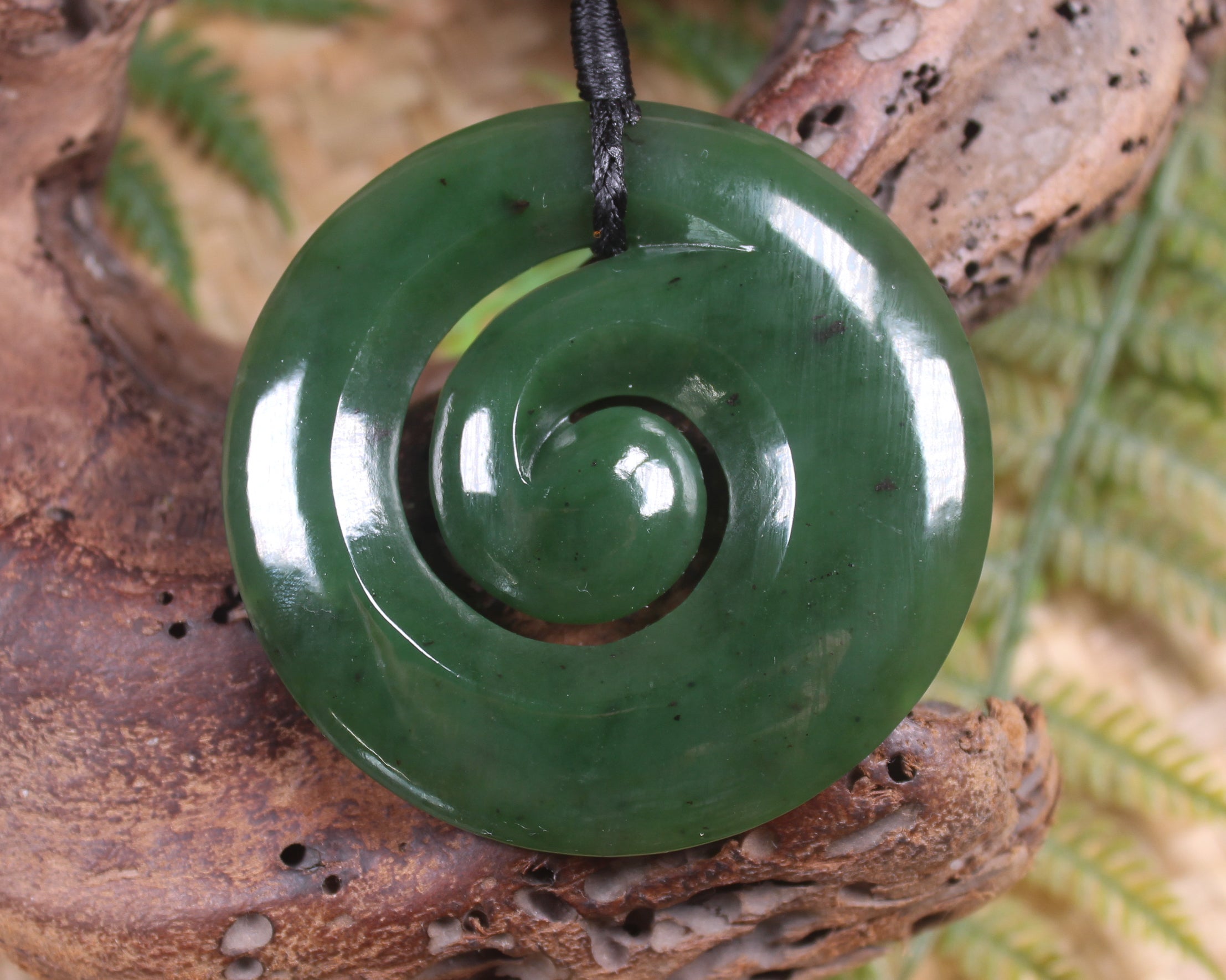 Koru pendant carved from Kawakawa Pounamu - NZ Greenstone