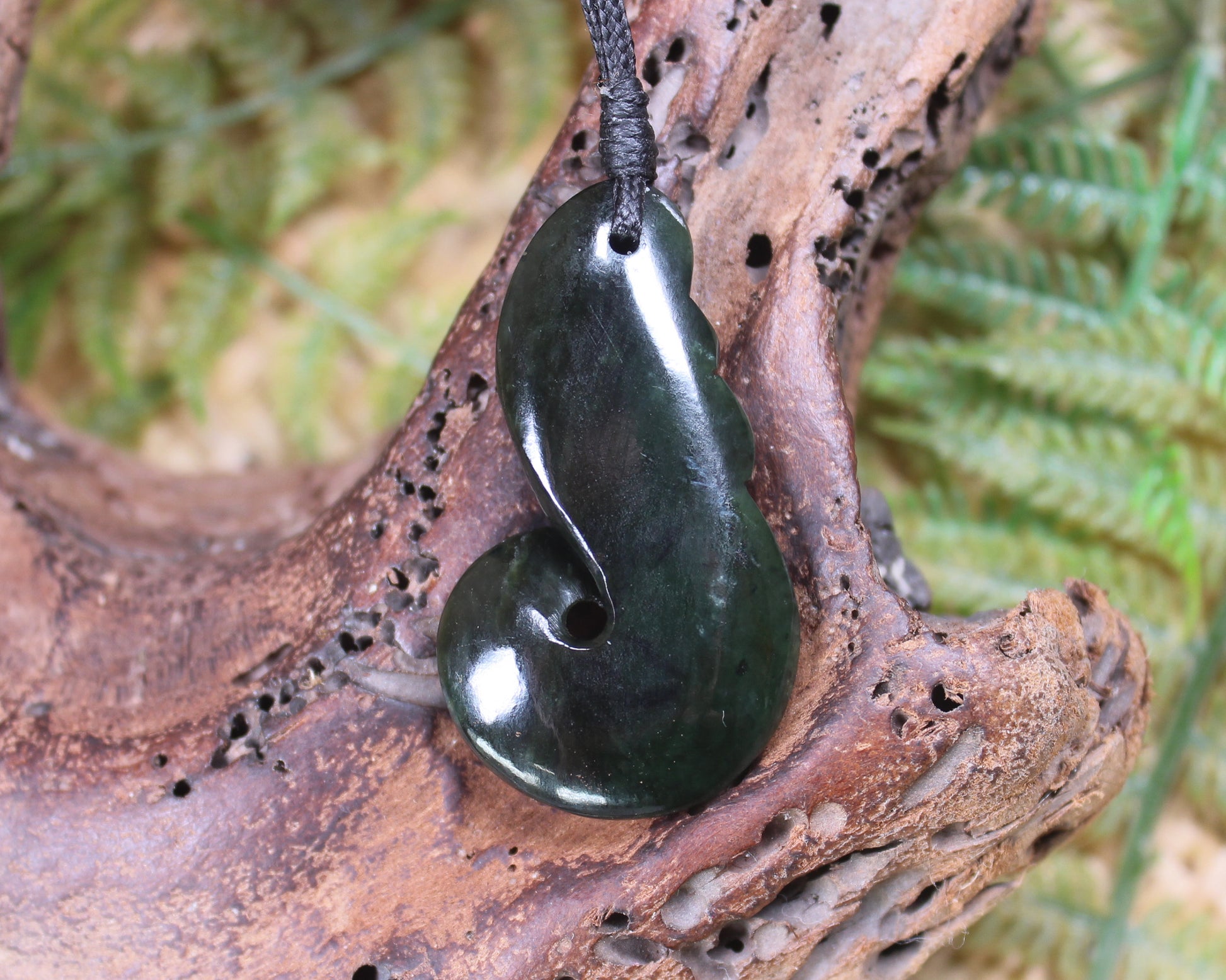 Koru carved from Rimu Pounamu - NZ Greenstone