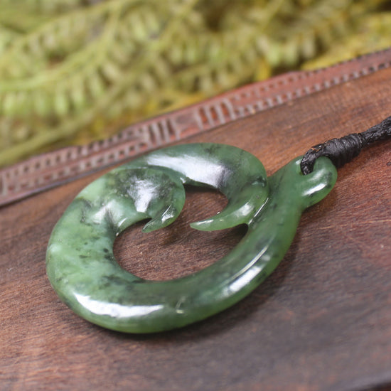 Koru Twist Pendant carved from Rimu Pounamu - NZ Greenstone