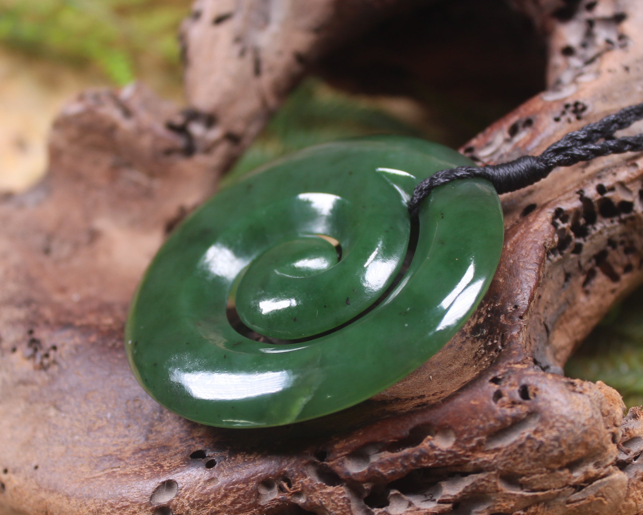 Koru pendant carved from Kawakawa Pounamu - NZ Greenstone