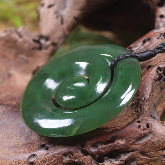 Koru pendant carved from Kawakawa Pounamu - NZ Greenstone
