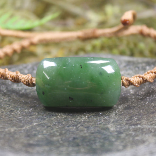 Adjustable cord bracelet with Hapopo Pounamu