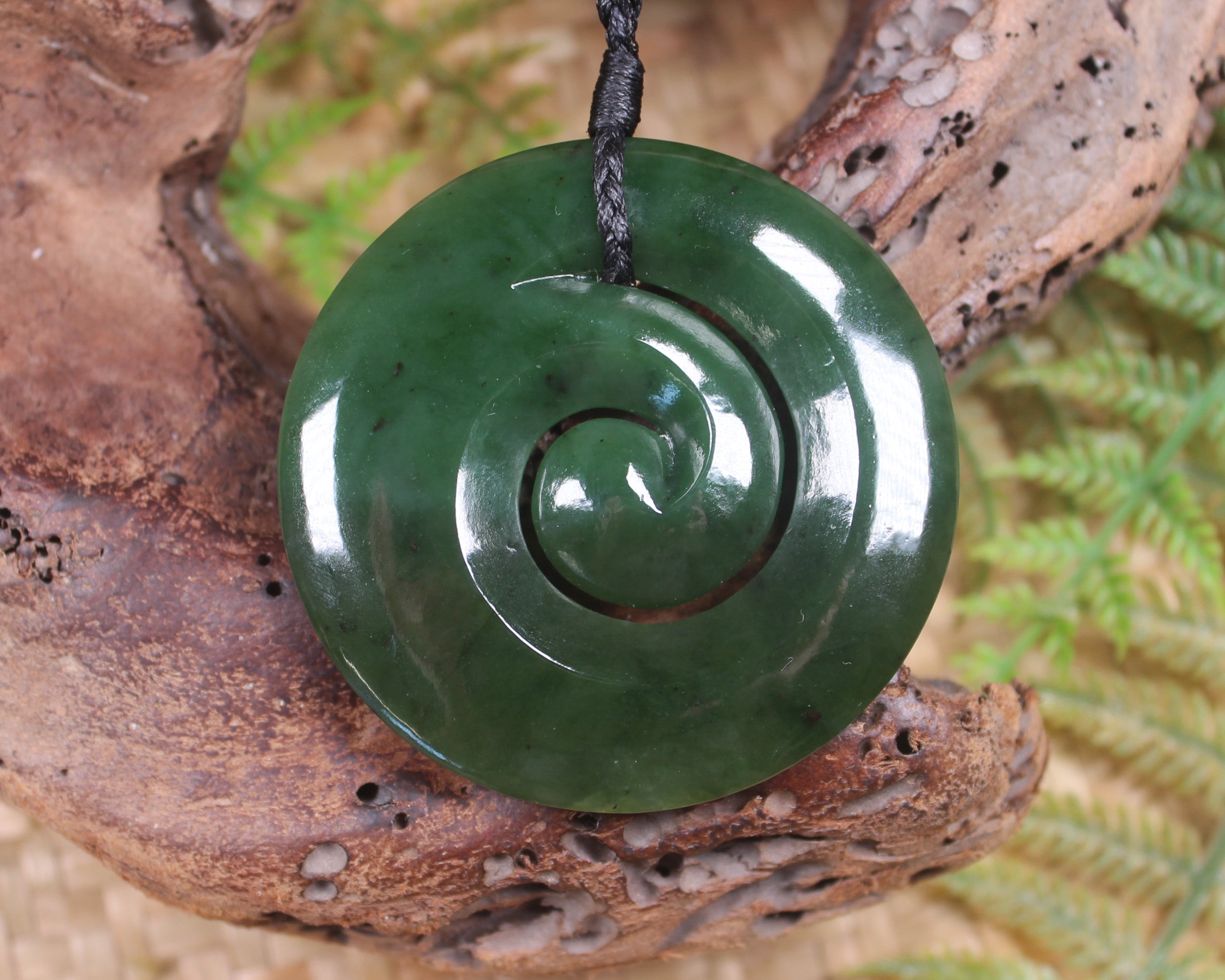 Koru carved from Rimu Pounamu - NZ Greenstone