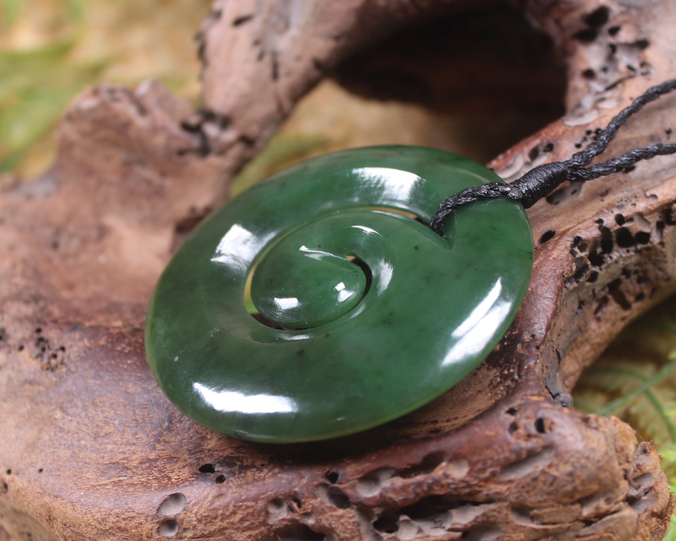 Koru carved from Rimu Pounamu - NZ Greenstone