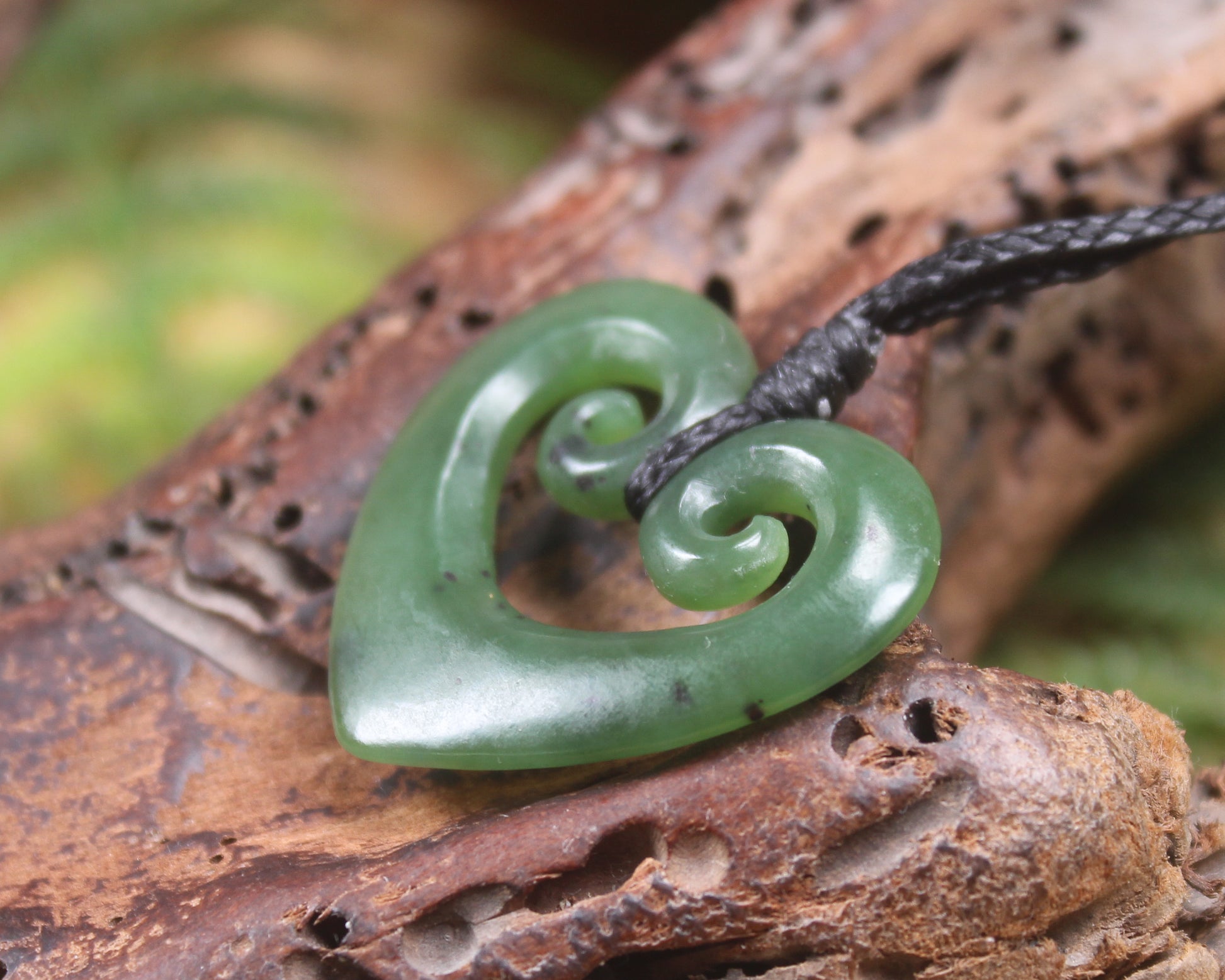 Koru Heart pendant carved from Hapopo Pounamu - NZ Greenstone