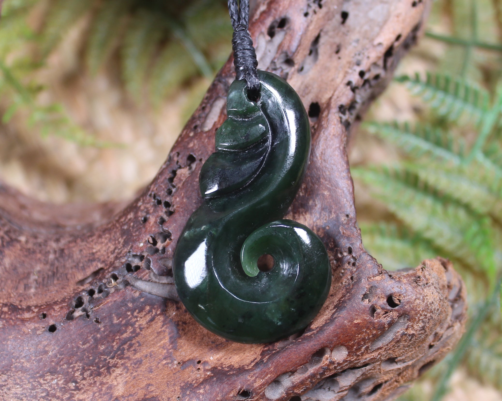 Koru carved from Rimu Pounamu - NZ Greenstone