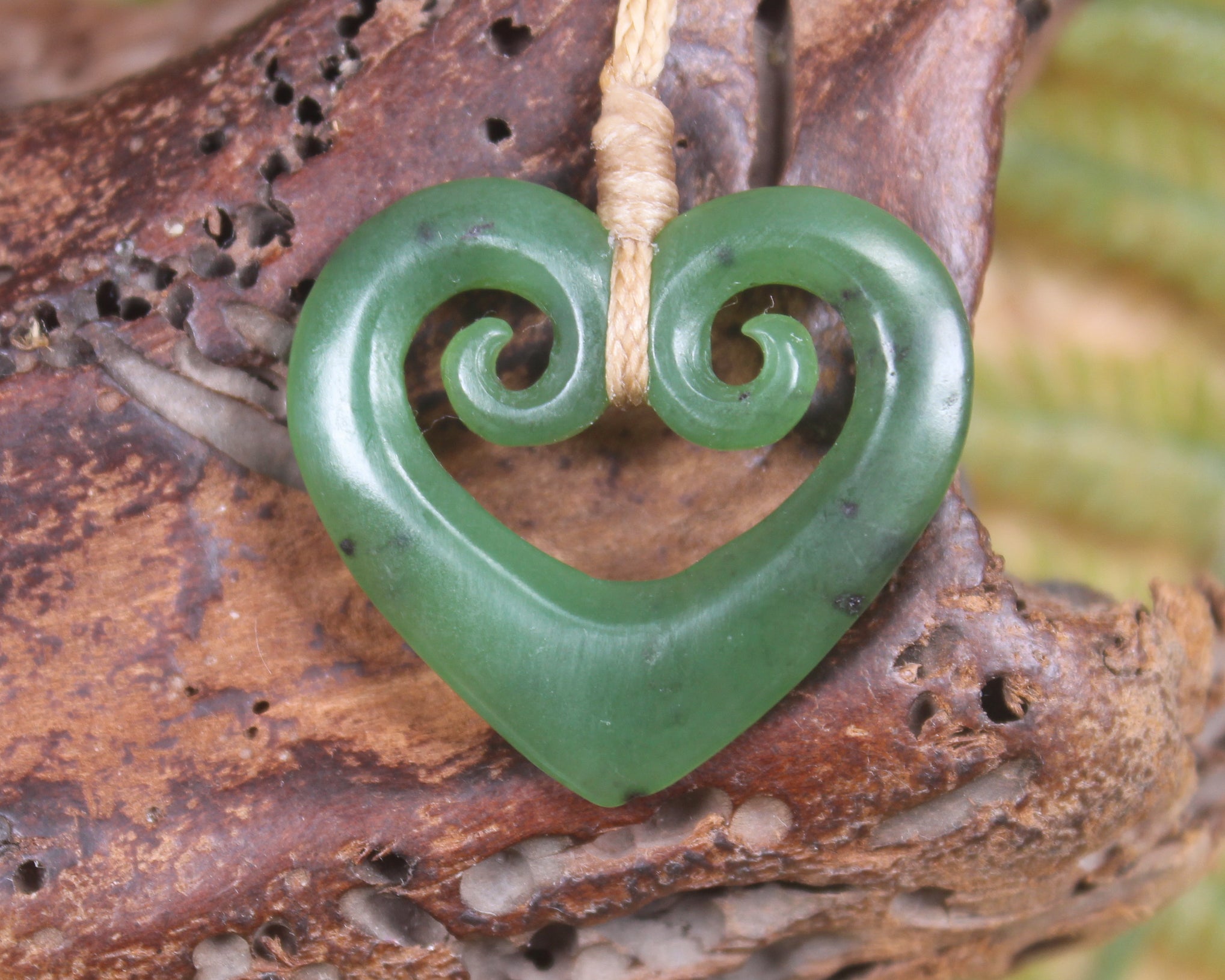 Koru Heart pendant carved from Hapopo Pounamu - NZ Greenstone