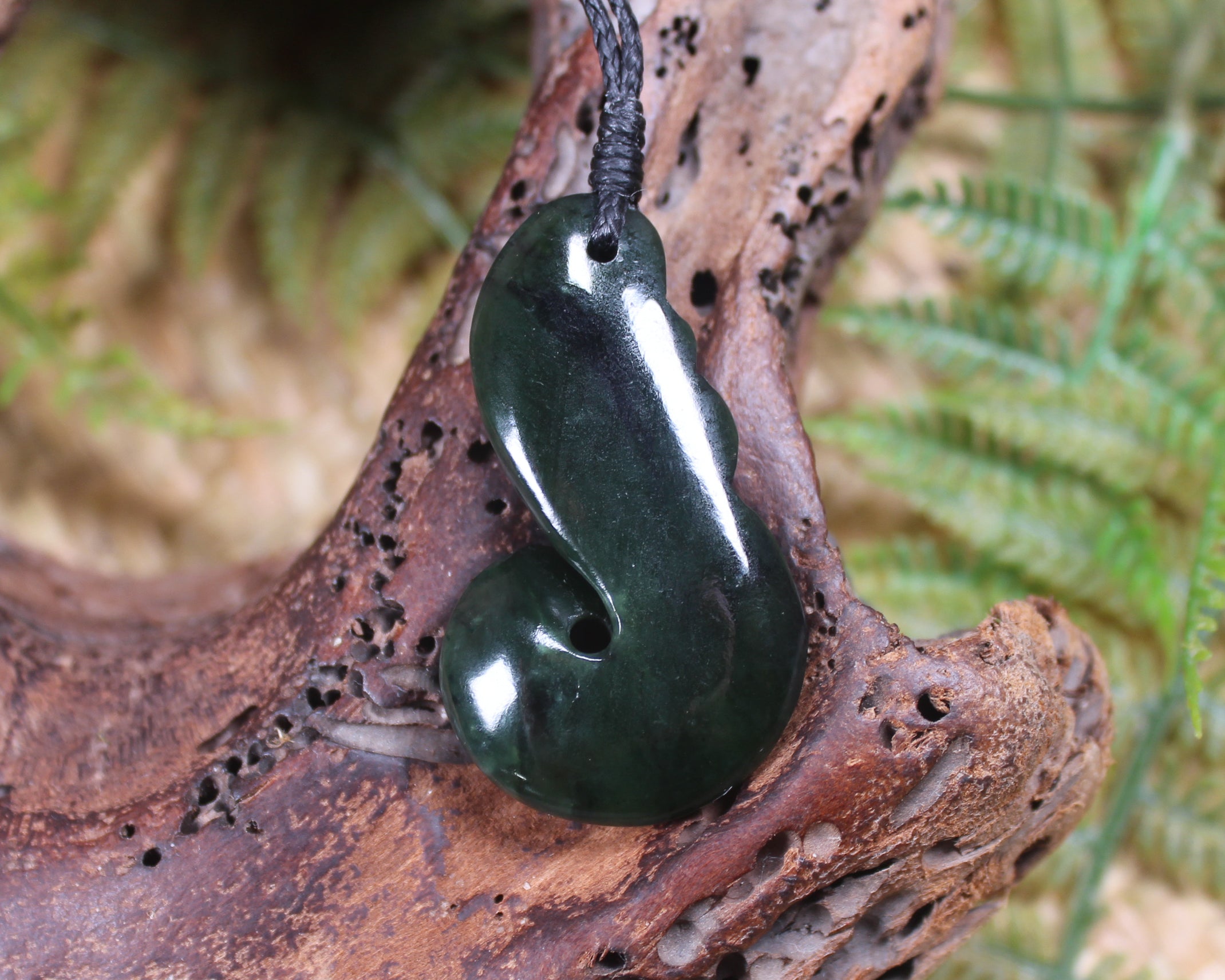 Koru carved from Rimu Pounamu - NZ Greenstone