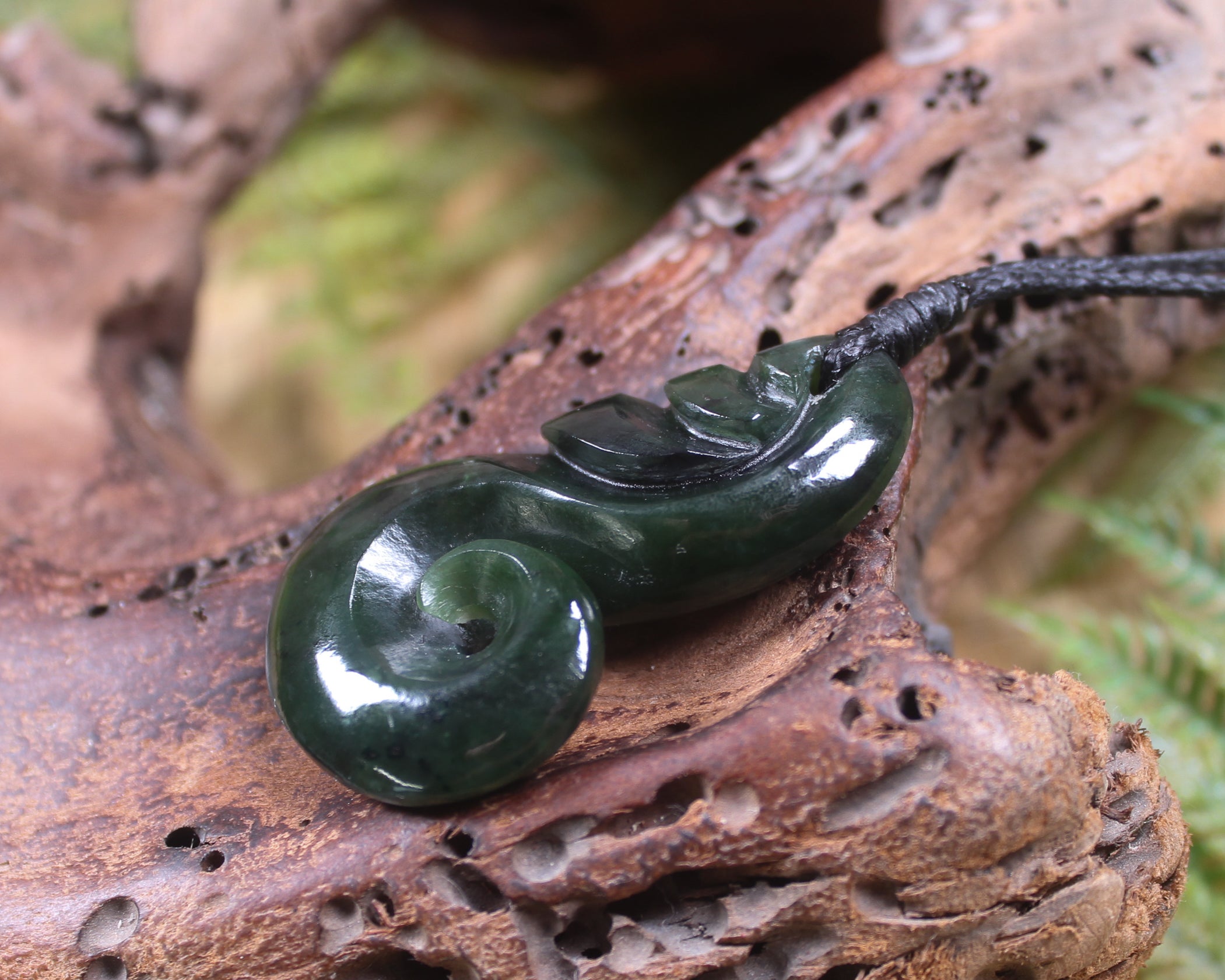 Koru carved from Rimu Pounamu - NZ Greenstone