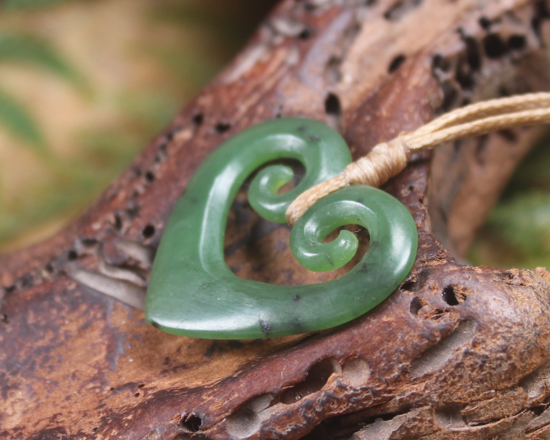Koru Heart pendant carved from Hapopo Pounamu - NZ Greenstone