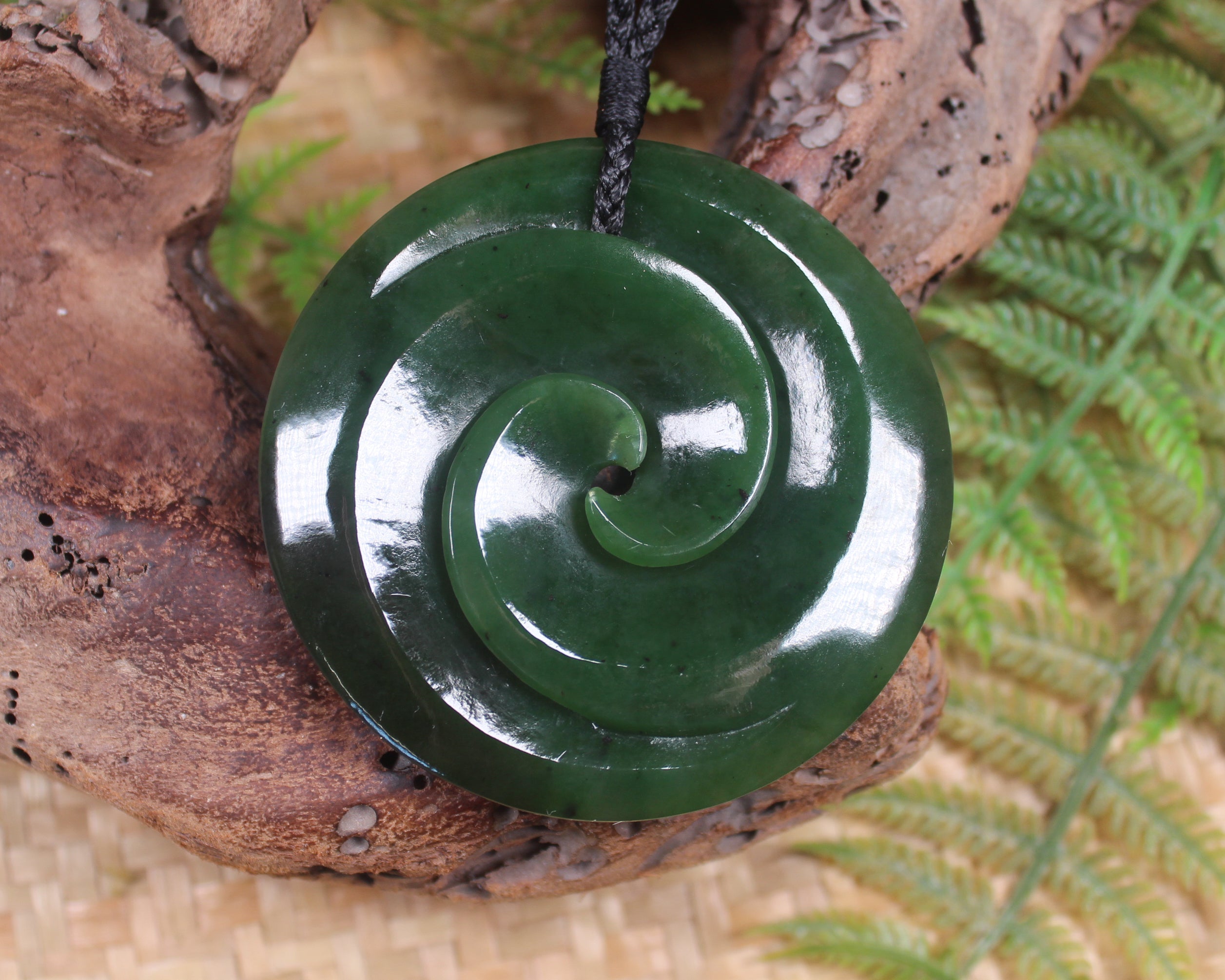 Koru pendant carved from Kawakawa Pounamu - NZ Greenstone