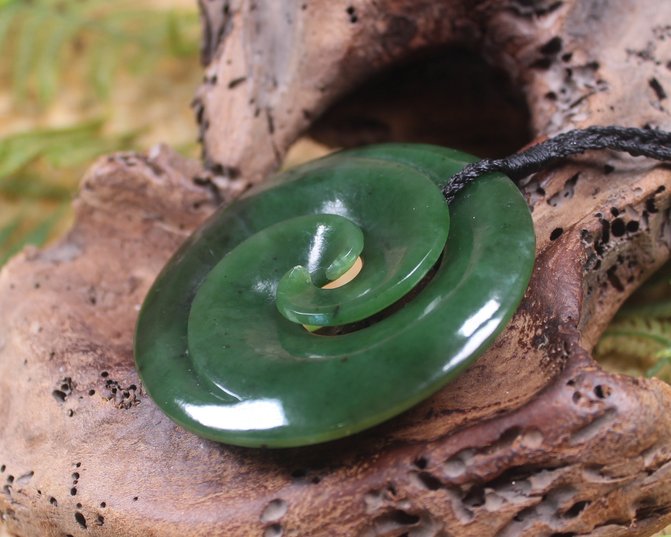 Koru pendant carved from Kawakawa Pounamu - NZ Greenstone