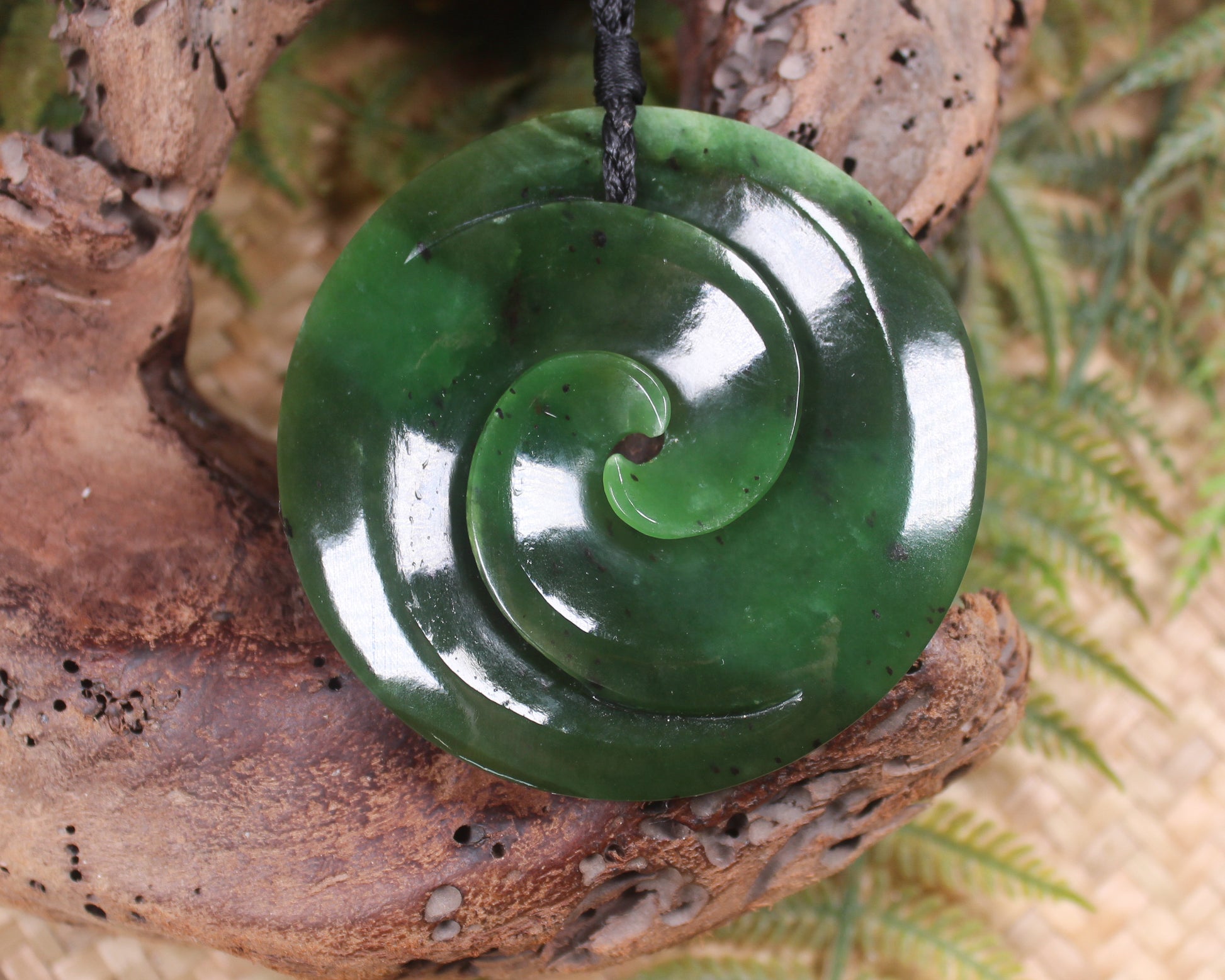 Koru carved from Rimu Pounamu - NZ Greenstone