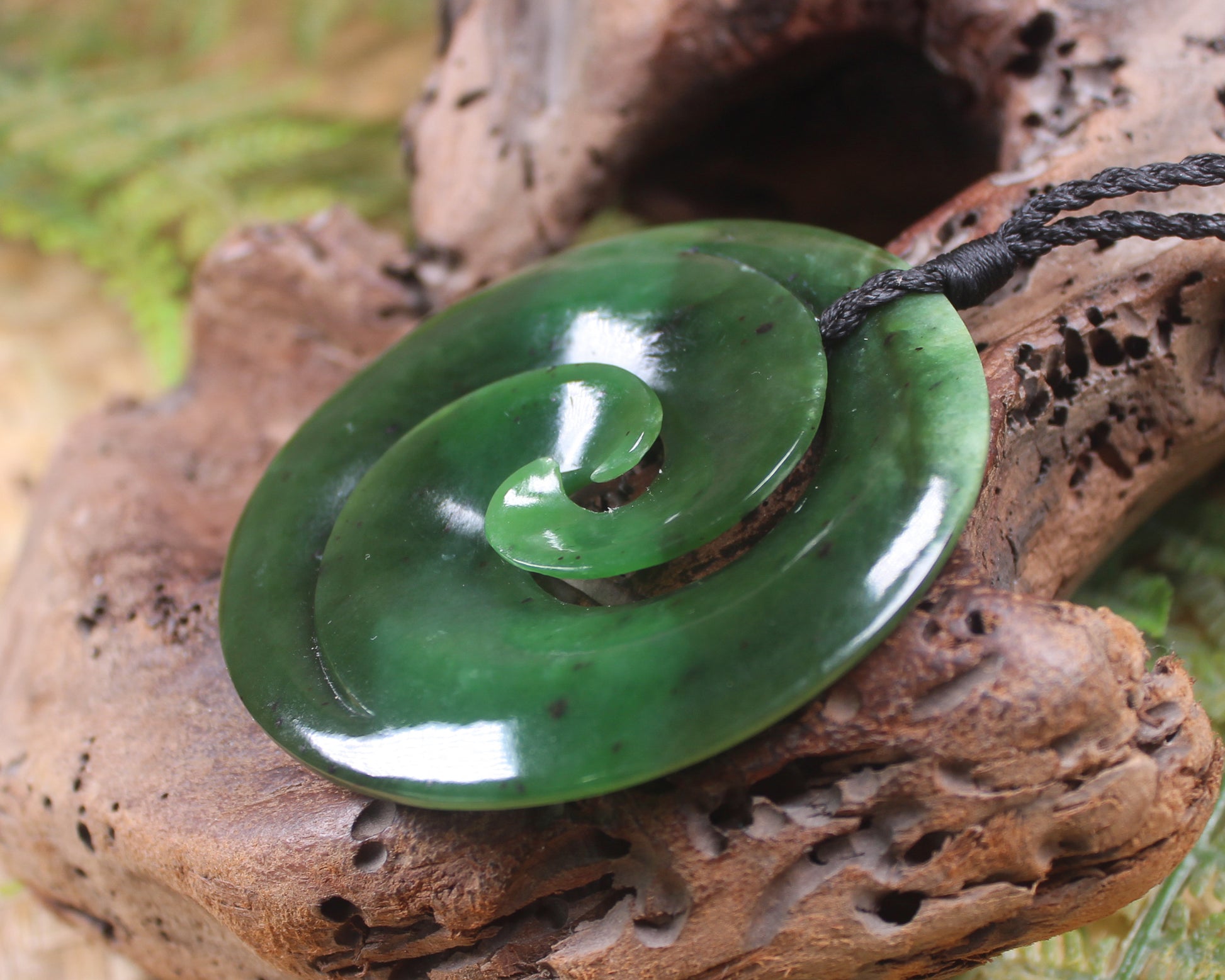 Koru carved from Rimu Pounamu - NZ Greenstone