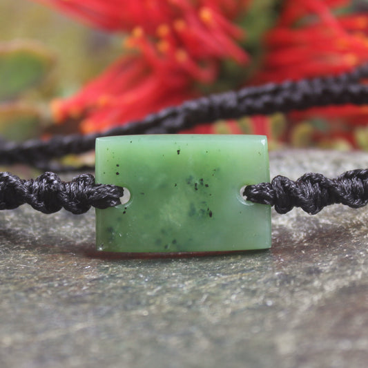 Adjustable cord bracelet with Hapopo Pounamu