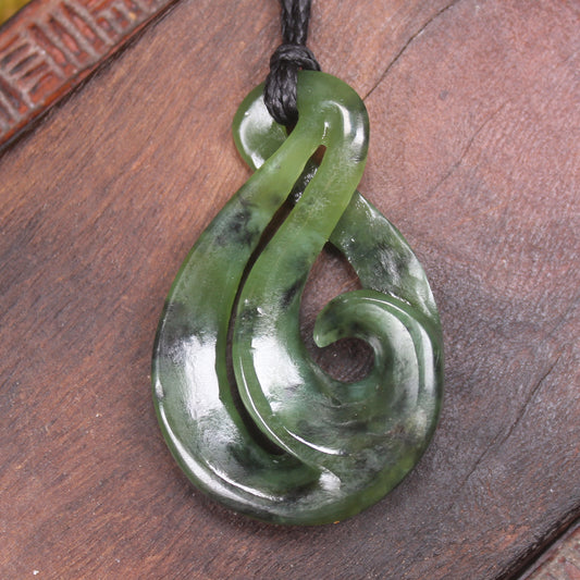Koru Twist Pendant carved from Rimu Pounamu - NZ Greenstone