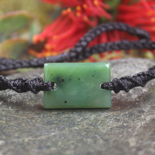 Adjustable cord bracelet with Hapopo Pounamu