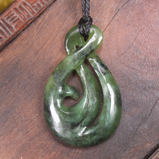 Koru Twist Pendant carved from Rimu Pounamu - NZ Greenstone